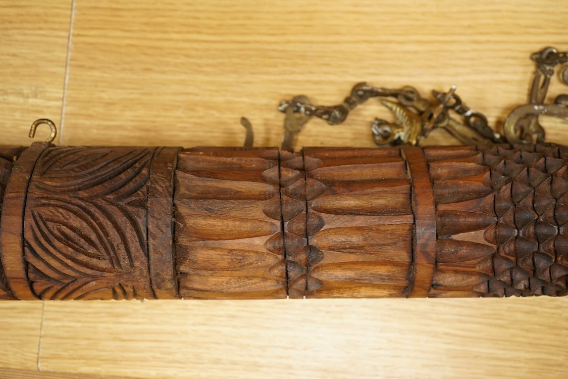 An African carved wood and cow-horn oliphant, 90cm